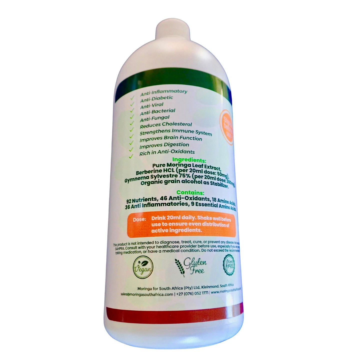 Back label of a 1-litre bottle of Healing by Nature's Organic Moringa Leaf Juice Extract, listing ingredients and health benefits for blood sugar support