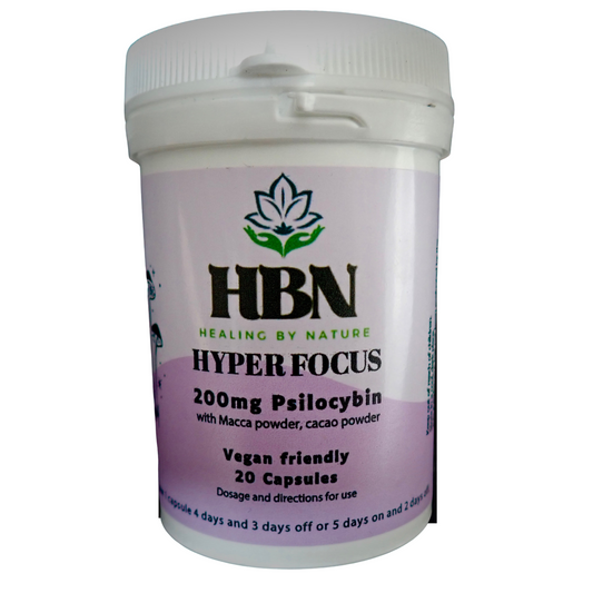 White bottle labeled "HBN Hyper Focus" with 200mg psilocybin, maca powder, and cacao powder. Vegan-friendly, 20 capsules for focus support.