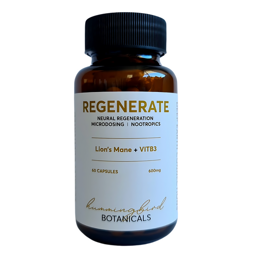 A bottle of Regenerate supplement featuring Lion’s Mane and Vitamin B3, designed for neural regeneration and nootropic support. The label indicates 60 capsules at 600mg from Hummingbird Botanicals.