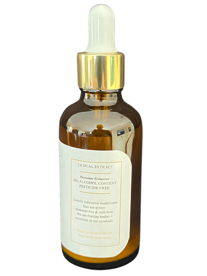 A brown tincture bottle with a gold dropper cap and a white label displaying product details on the back, featured for the Healing by Nature website.







