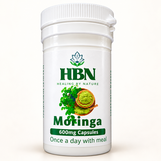 Healing by Nature Moringa bottle labelled 600 mg capsules on a light background
